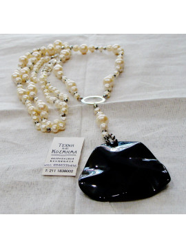 Necklace (65 cm.) With south sea pearl and obsidian stone