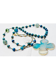 Necklace from aqua marine with four leaf element.