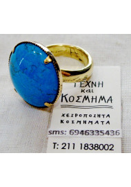 Ring with mineral circular stone in 24 k gilding