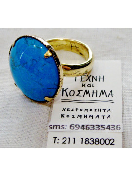 Ring with mineral circular stone in 24 k gilding