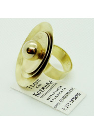 Obsolete ring T.K.